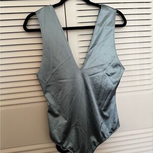 Free People Sleek V-Neck Satin Bodysuit in Shimmering Steel Blue